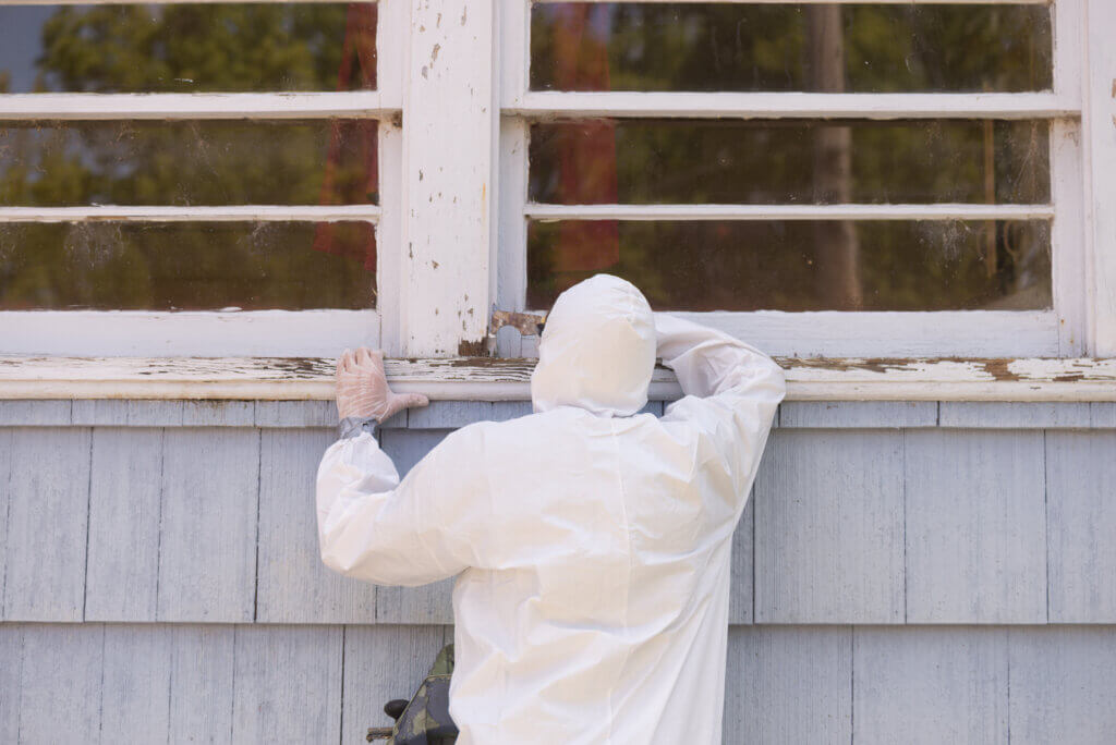 Lead-based paint is professionally removed from the exterior of a home.